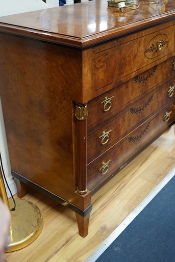 A Biedermier style bird's eye maple commode, width 124cm, depth 54cm, height 96cm